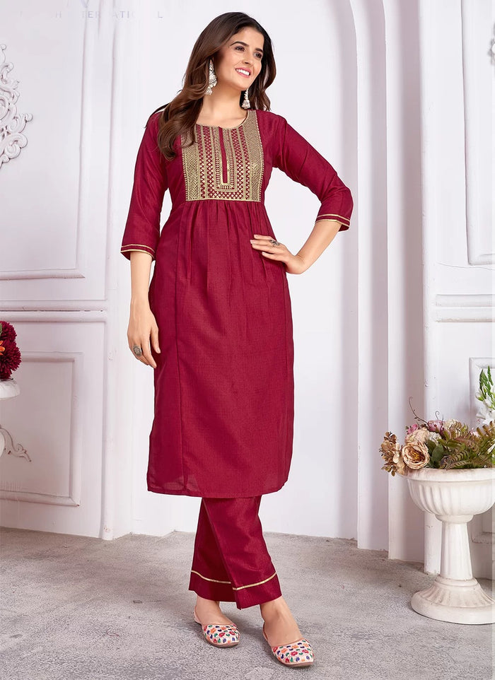 Hot pink vertical silk readymade suit with heavy sequin embroidery and Banarasi dupatta for festive and party wear