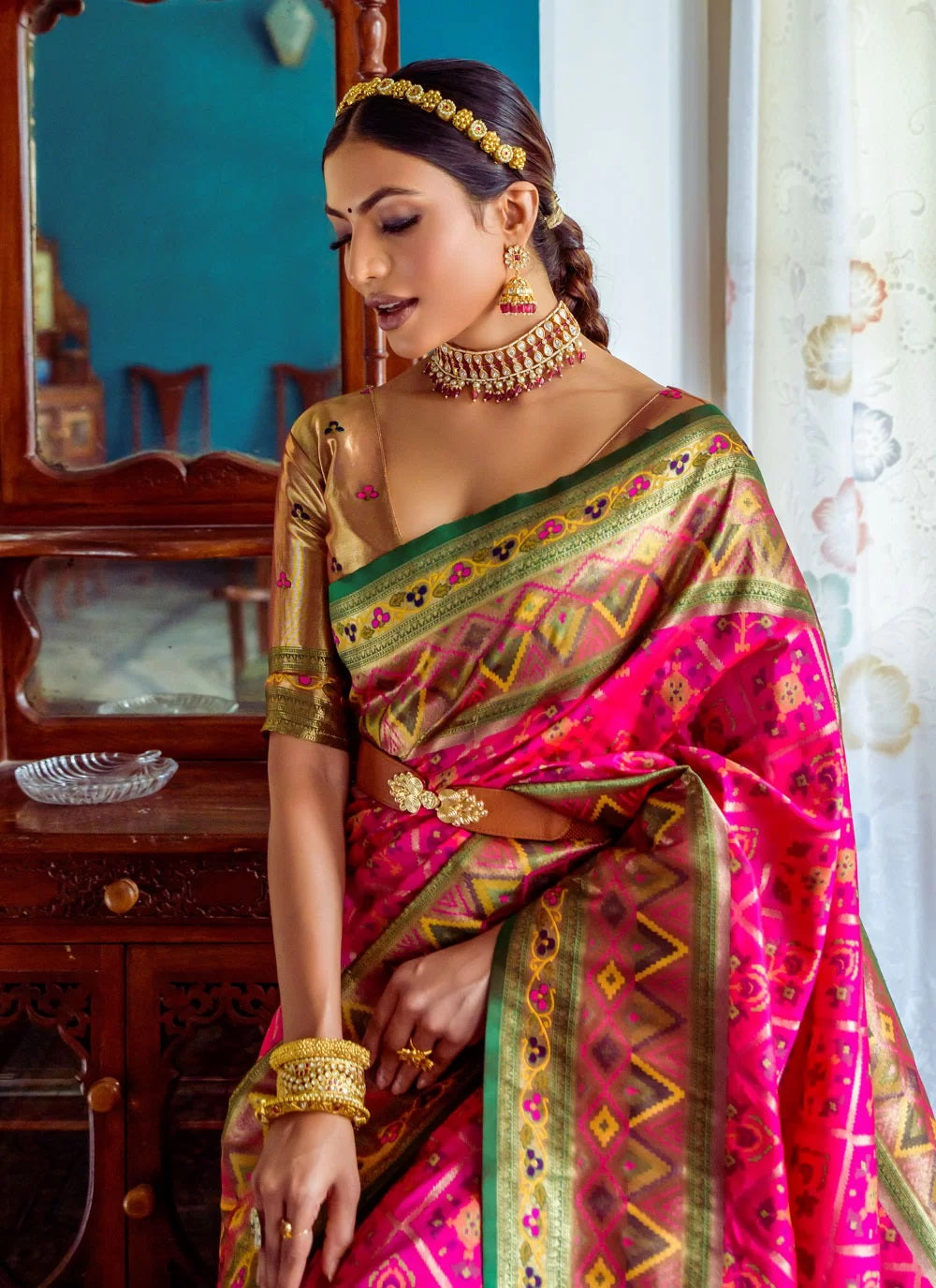 Wedding Wear Patola Woven Art Silk Saree in Magenta
