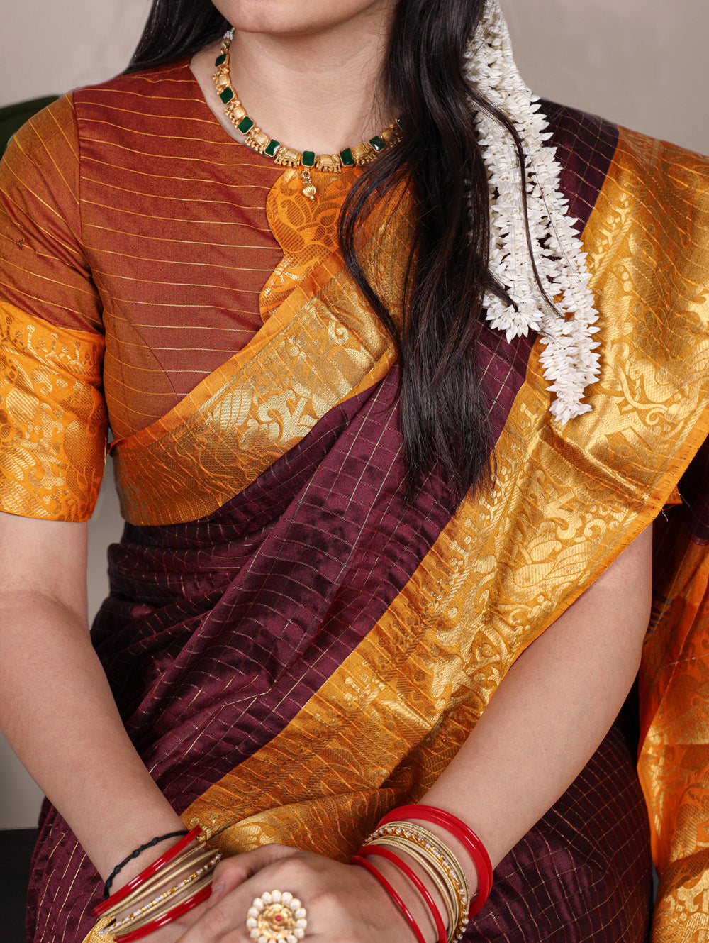 Brown chex pattern saree with zari border
