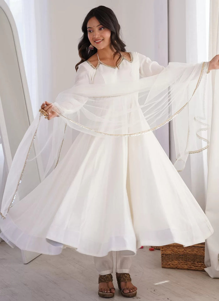 White luxury Roman Silk Chanderi Anarkali suit with net dupatta