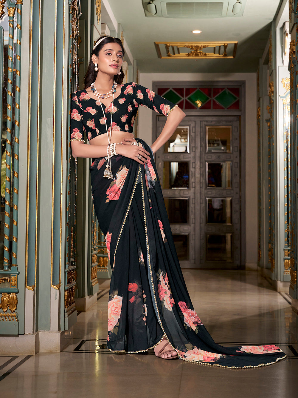 Elegant black festive saree with matching blouse