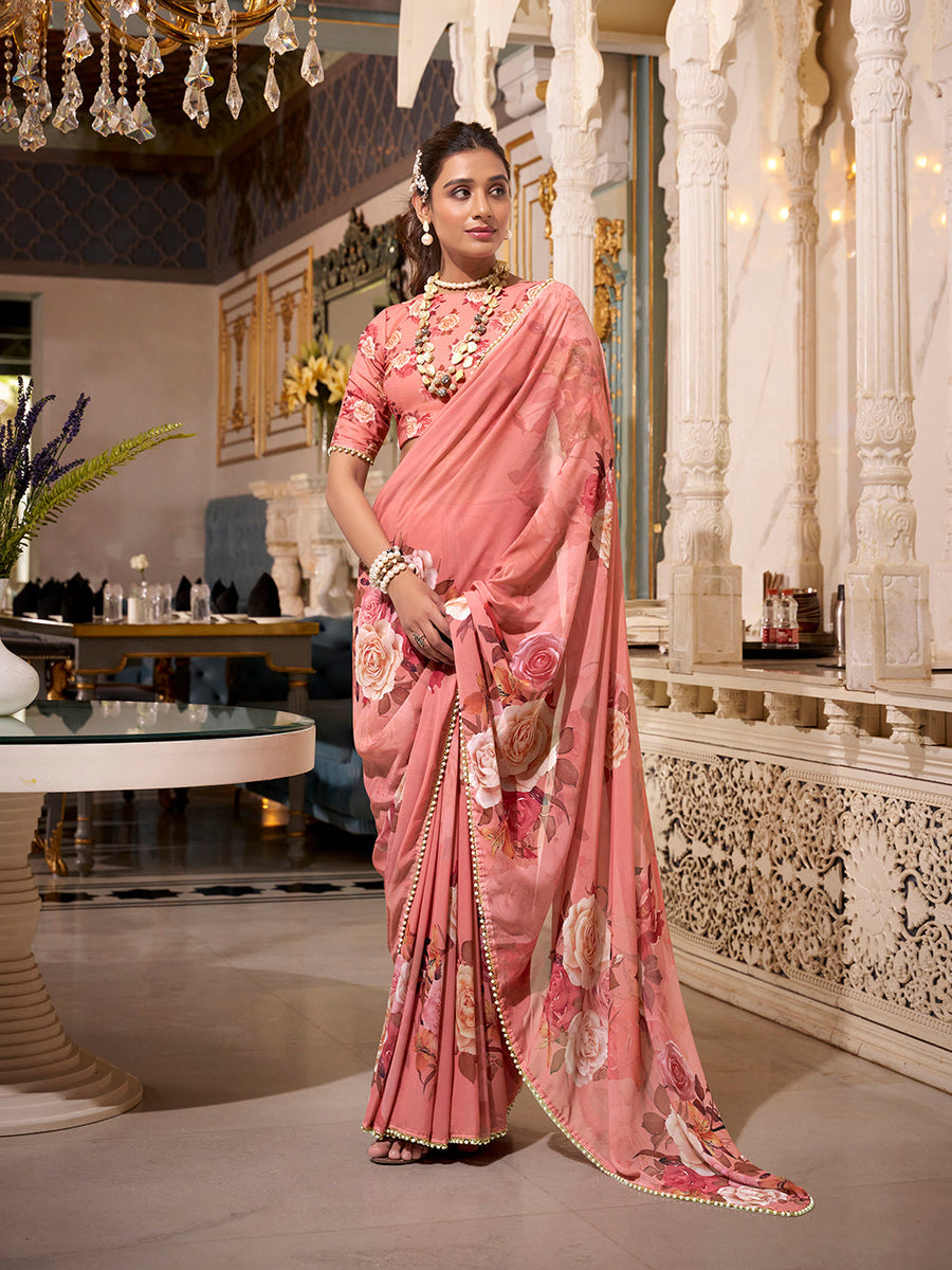 Orange georgette saree with pearl lace border