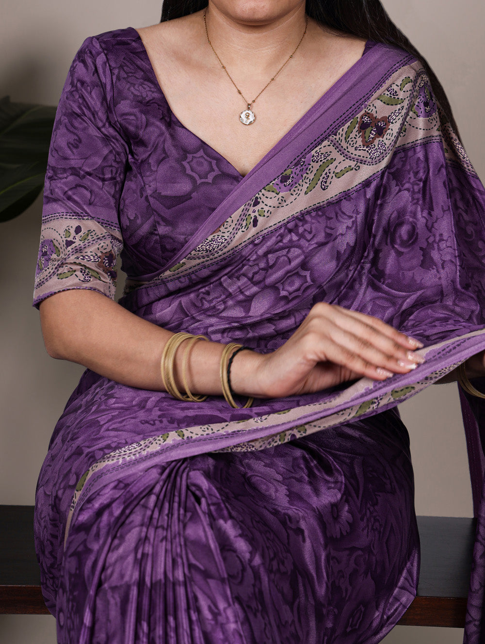 Printed purple saree with matching blouse