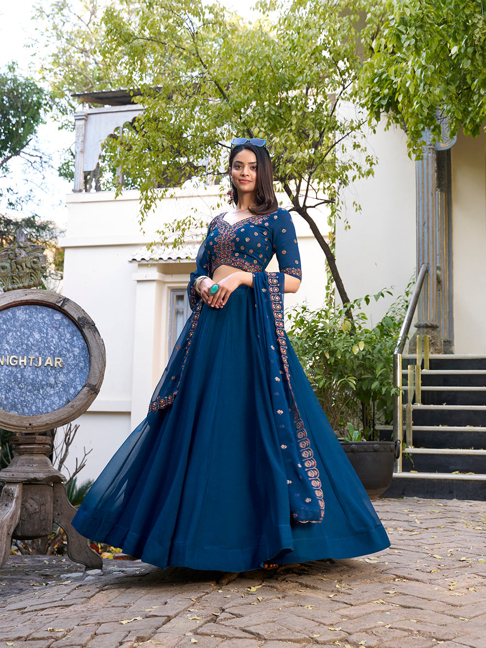 Firozi Color Plain With Sequins And Thread Embroidery Work Georgette Lehenga Choli