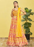 Yellow Chinnon Mirror sequins and Printed work Party wear lehenga