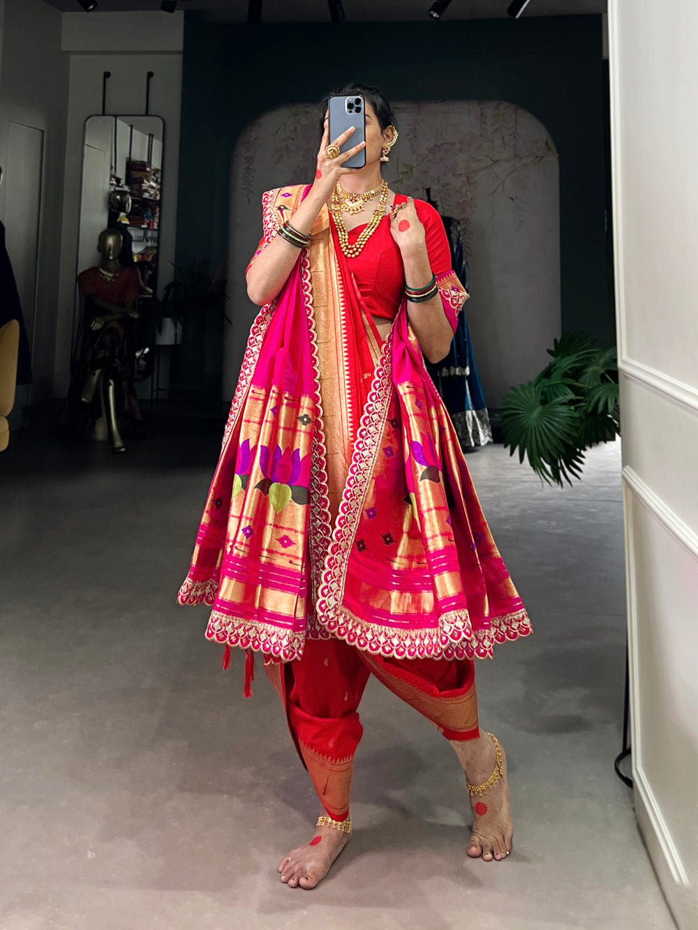 Traditional bridal paithani saree in red