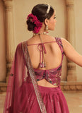 Luxurious Deep pink and purple embroidered lehenga for bride